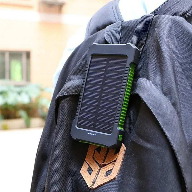 14 portable charger solar power bank clipped to a backpack